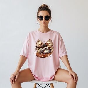 🏈 Sparkle & Spike: Gold Glitter Football Bow t-shirt. Touch down game ready